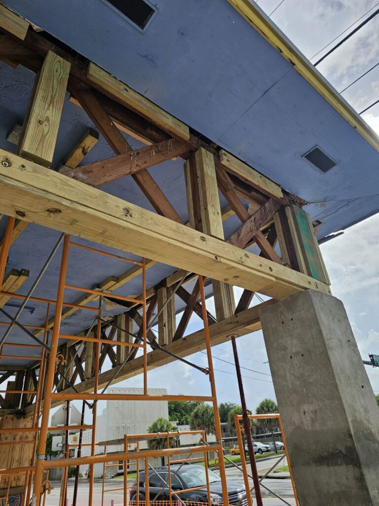 Structural restoration work on a commercial building in Little Haiti, Miami - wood truss reinforcement